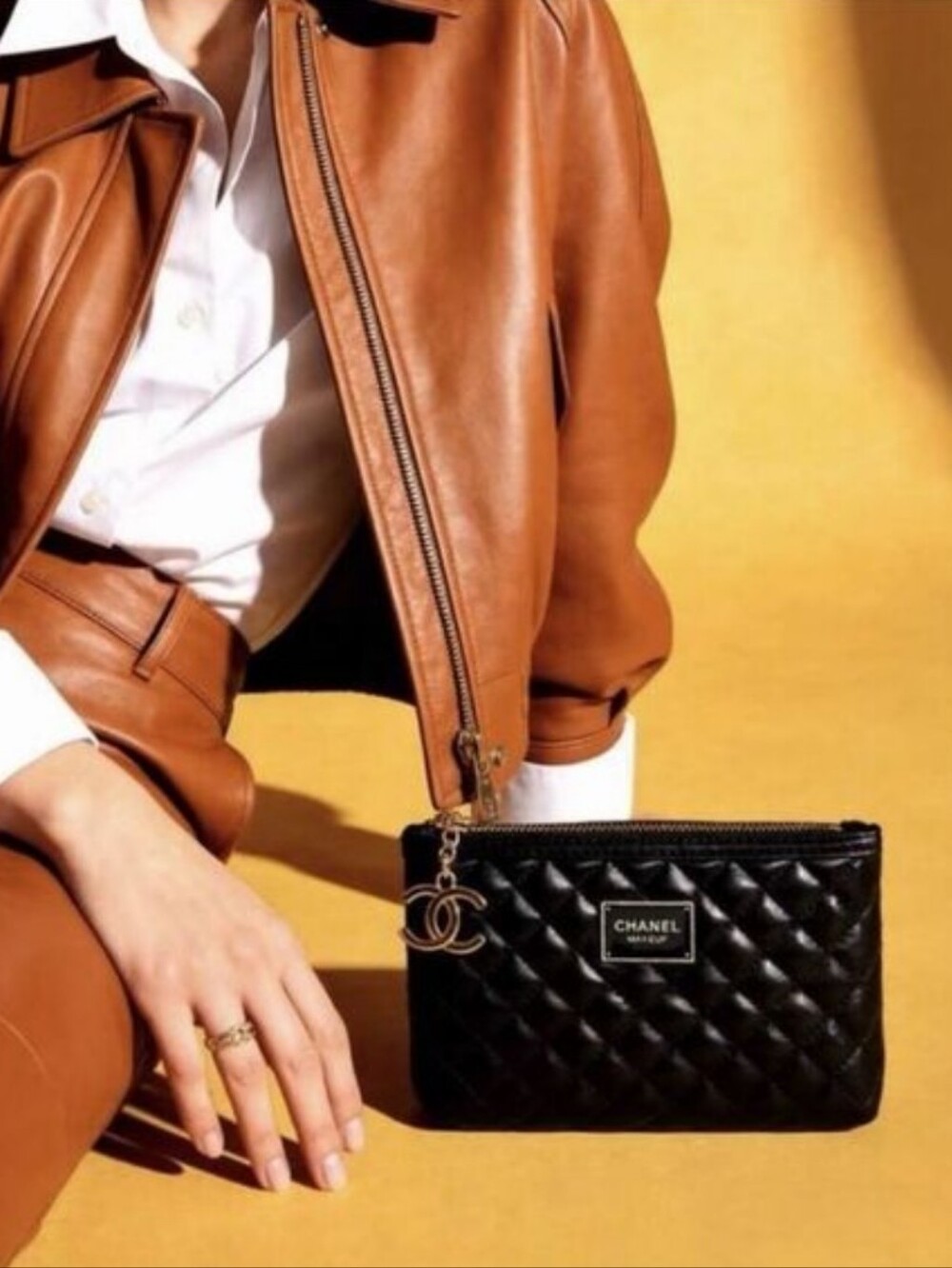 Iconic Logo Black Quilted Leather Cosmetic Pouch with Gold CC Charm